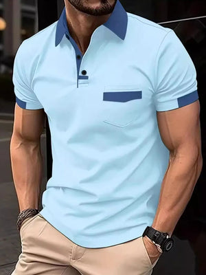 Color-blocked polo shirt in mint blue with navy accents on collar, pocket, and sleeves.