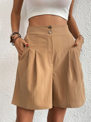 Khaki pleated front bermuda shorts with a double button closure and cuffed hem.