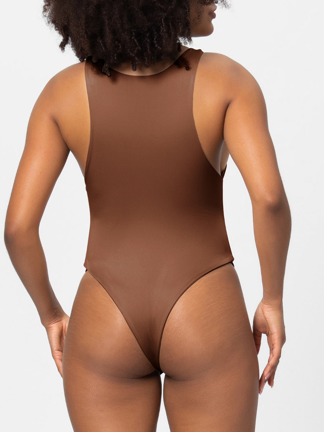 Brown tank bodysuit with high-cut legs and a racerback detail.