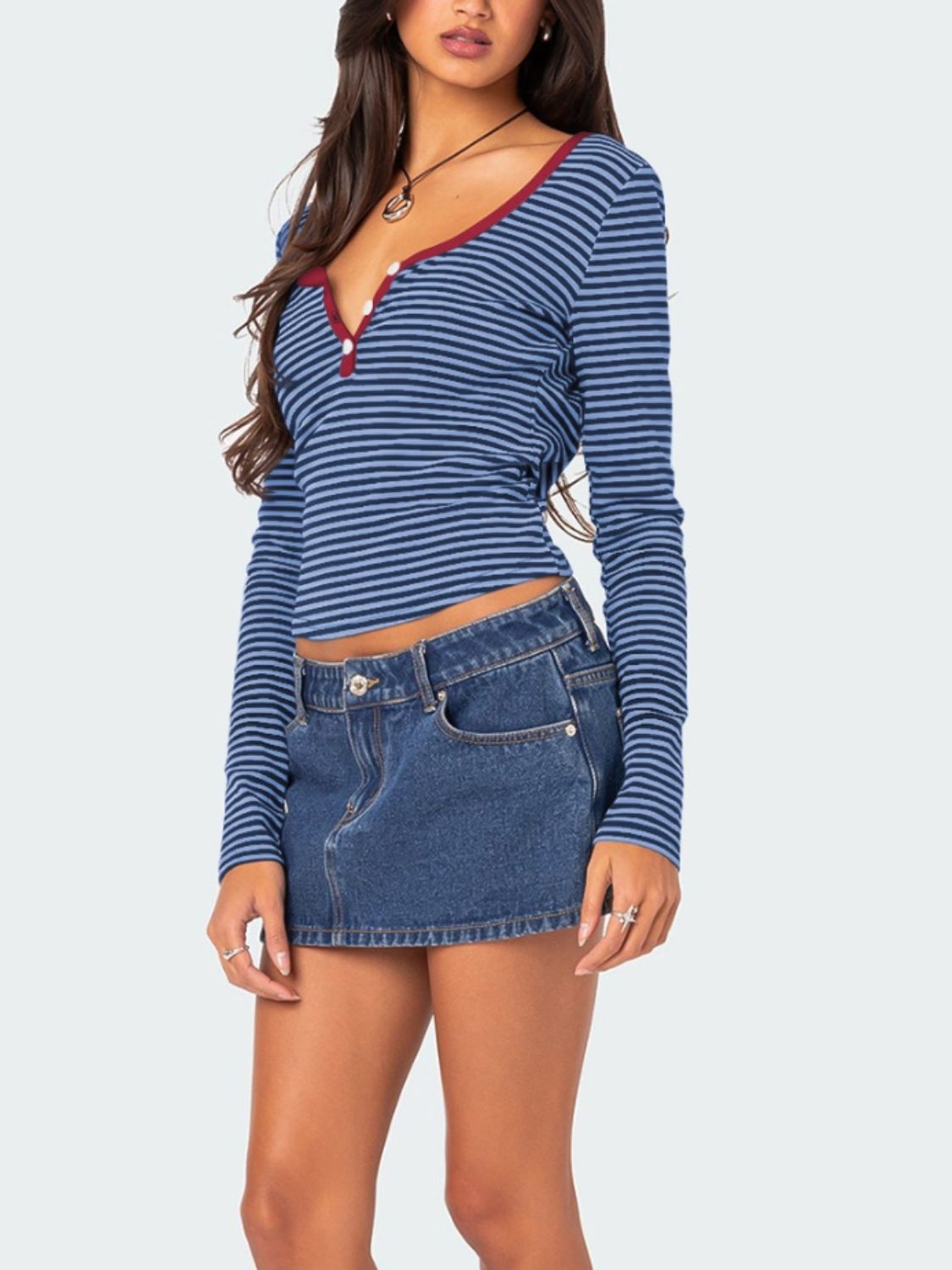 Blue striped long sleeve henley shirt with contrast collar and button detail