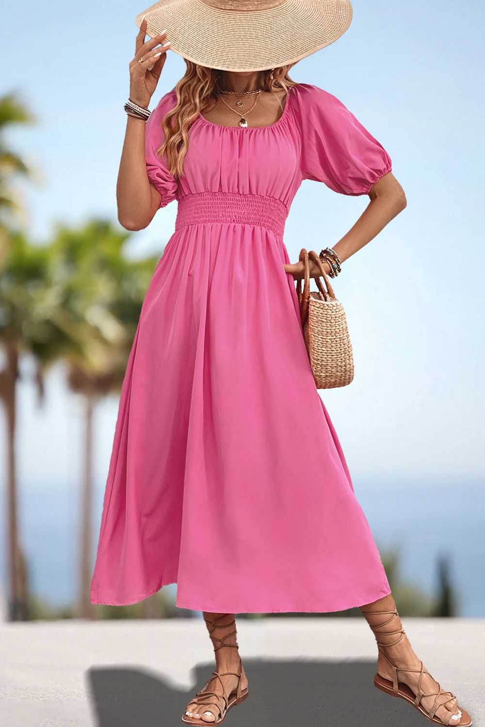 Pink off-shoulder puff sleeve empire midi dress with smocked waist and A-line skirt.