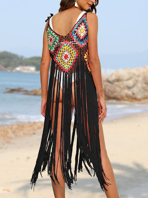 Crochet patchwork cover-up dress with multicolor squares and long black fringe.