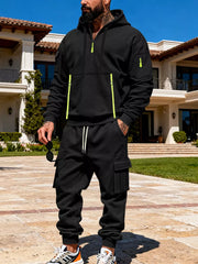 Black half-zip hoodie with neon accents and matching cargo sweatpants set.