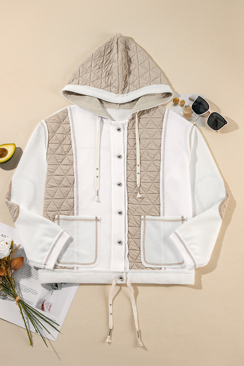 Quilted panel waffle knit hoodie in white with adjustable drawstring and button front.