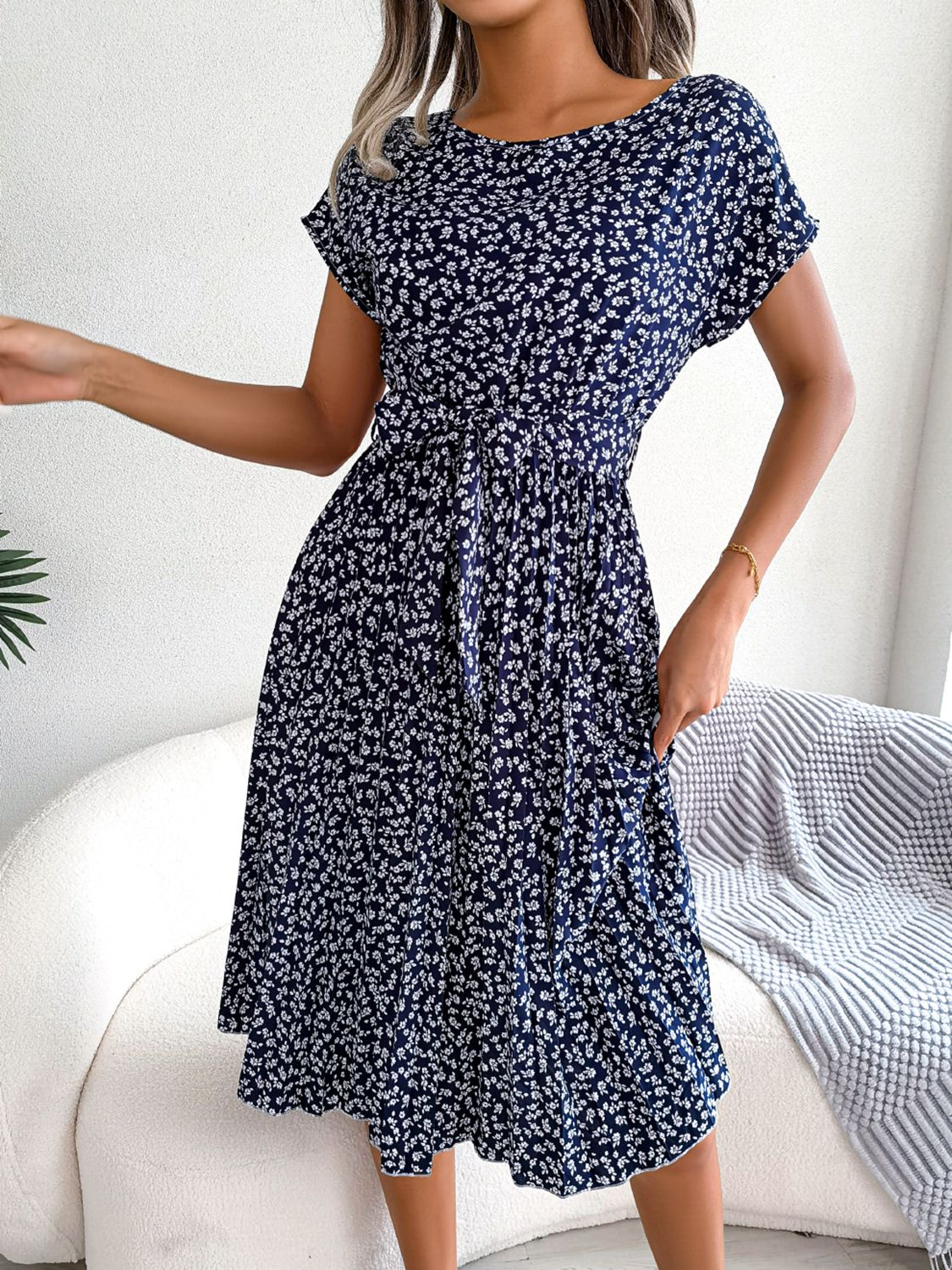 Navy floral print midi dress with tie waist and short sleeves