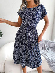Navy floral print midi dress with tie waist and short sleeves
