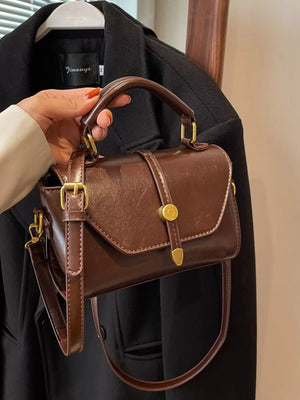Brown mini pu leather crossbody bag with clasp and adjustable strap