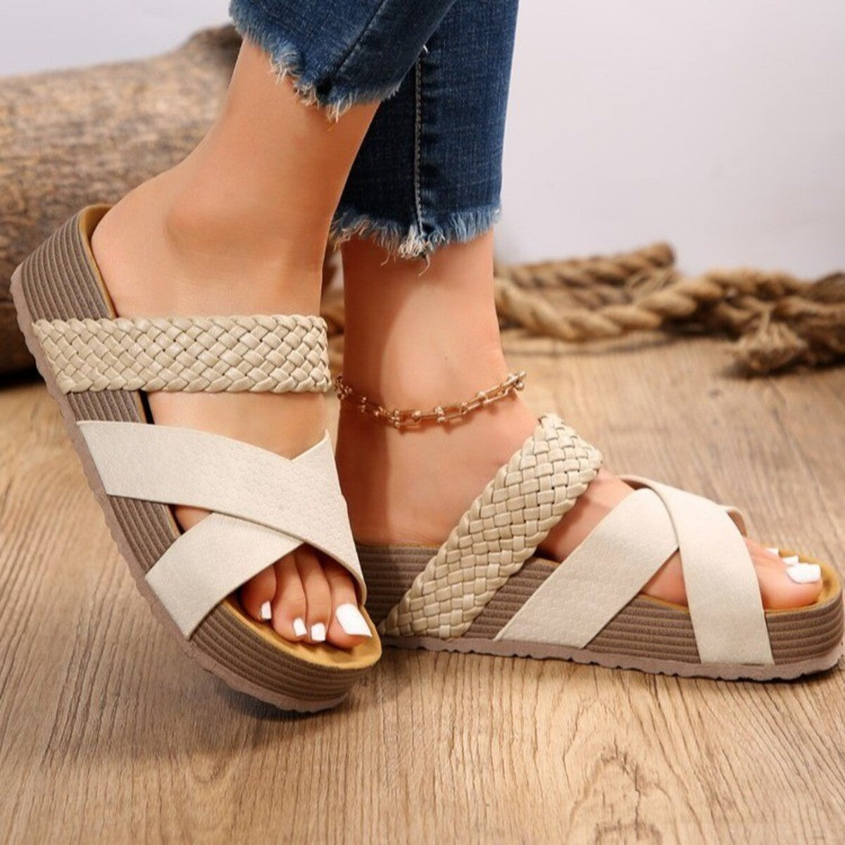 Braided strap platform sandals in beige white with crisscross straps and a thick sole.