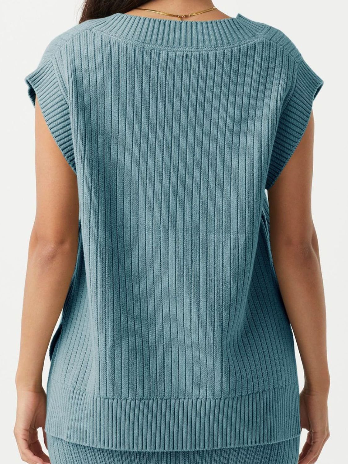 Air Force Blue ribbed knit V-neck tank sweater with cap sleeves and a sculpted fit.
