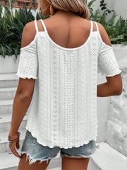 White eyelet cold shoulder blouse with scalloped hem and short sleeves.