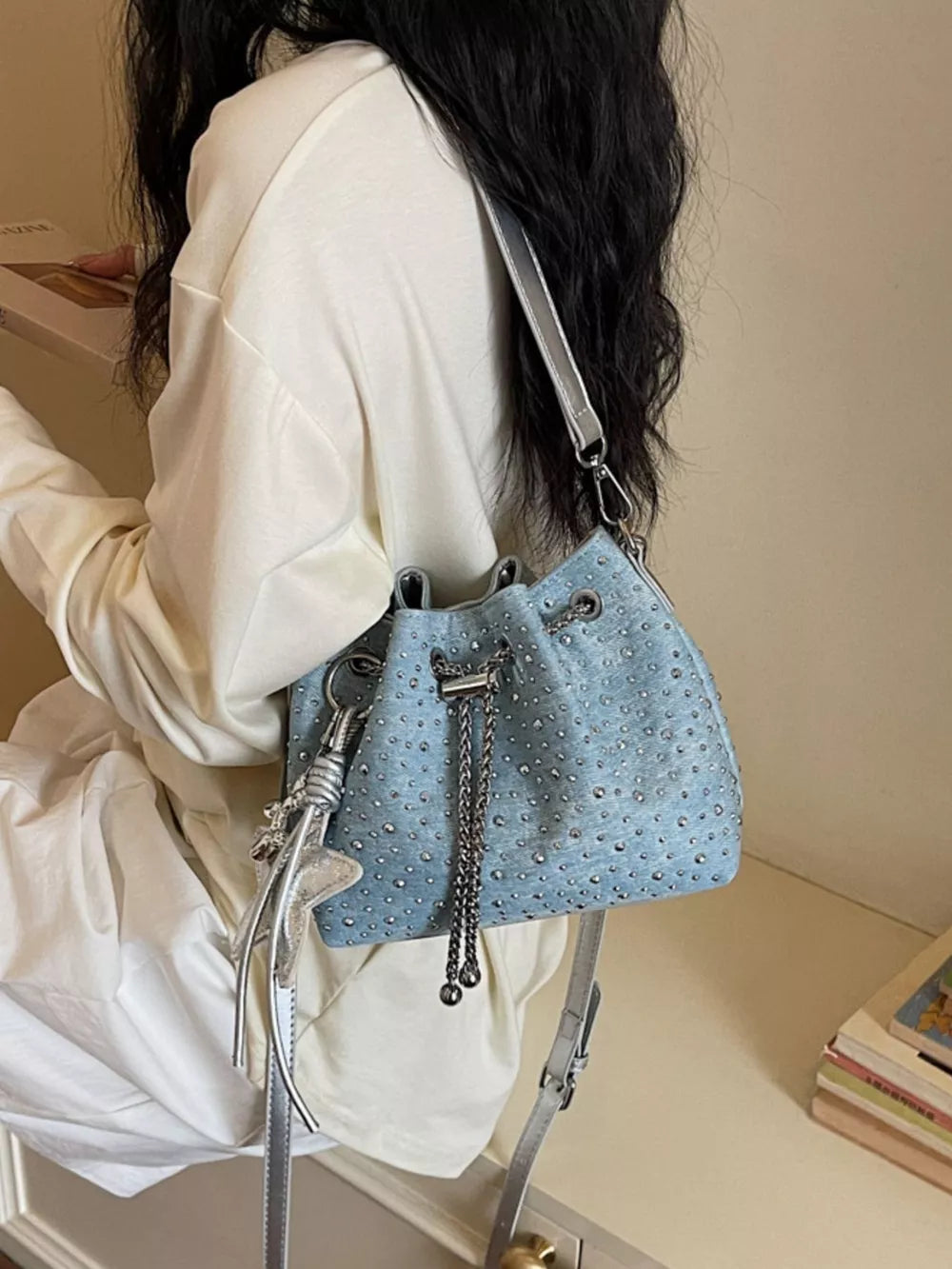 Drawstring Bucket Crossbody Bag in Blue, back view