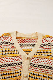 Geometric knit cropped cardigan in khaki with button front and V-neck.