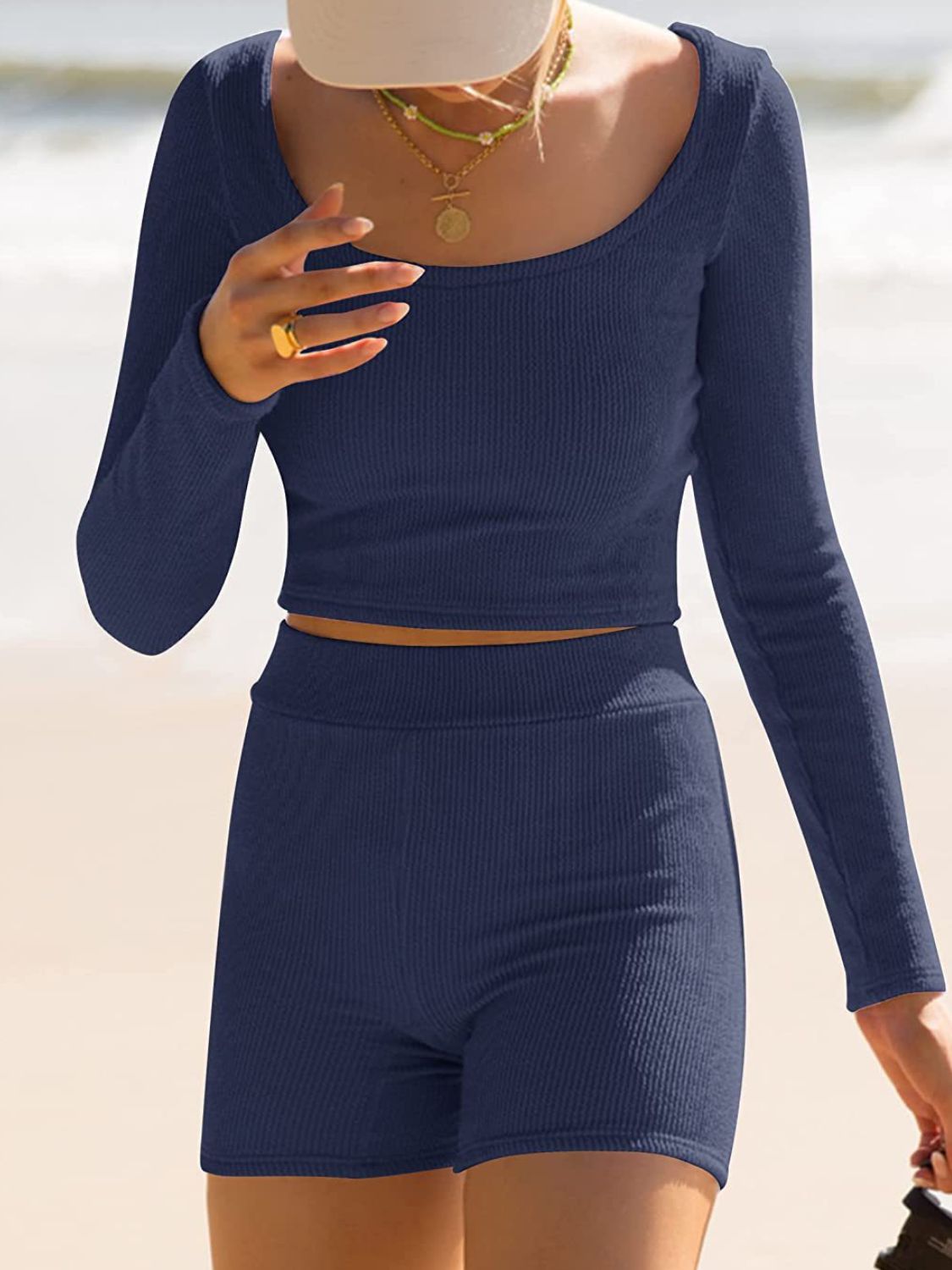 Textured ribbed scoop neck long sleeve crop top and shorts set in blue.