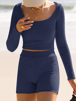 Textured ribbed scoop neck long sleeve crop top and shorts set in blue.