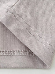 Gray cotton t-shirt detail showing stitching and fabric texture.