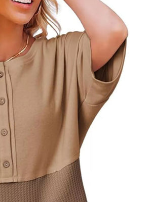 Khaki waffle-knit t-shirt with button detail and short sleeves.