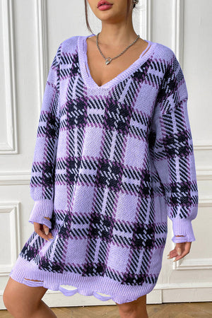 Distressed hem plaid knit mini dress in light indigo with v-neck and long sleeves.