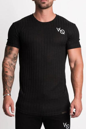 Black ribbed tee with short sleeves and a logo detail on the chest.