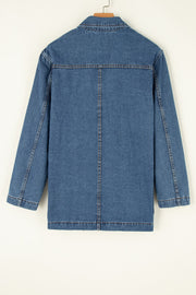 Medium wash denim blazer with double-breasted cut and contrast stitching.