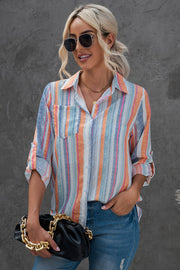 Coastal Stripe Button-Down Blouse in orange and blue with rolled sleeves and a chest pocket.