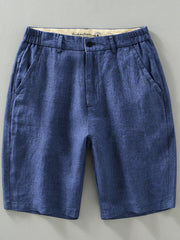 Blue chino shorts with elastic waistband and front pockets.