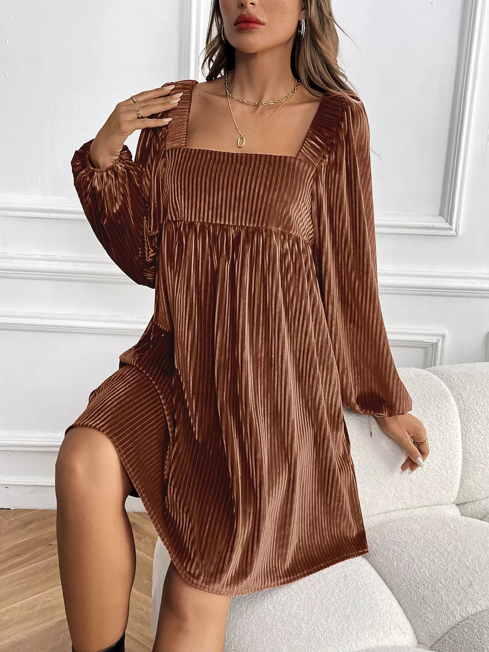 Brown velvet mini dress with square neckline and long sleeves