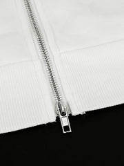 White zip-up hoodie with black stripes and a bow detail, featuring a silver zipper.