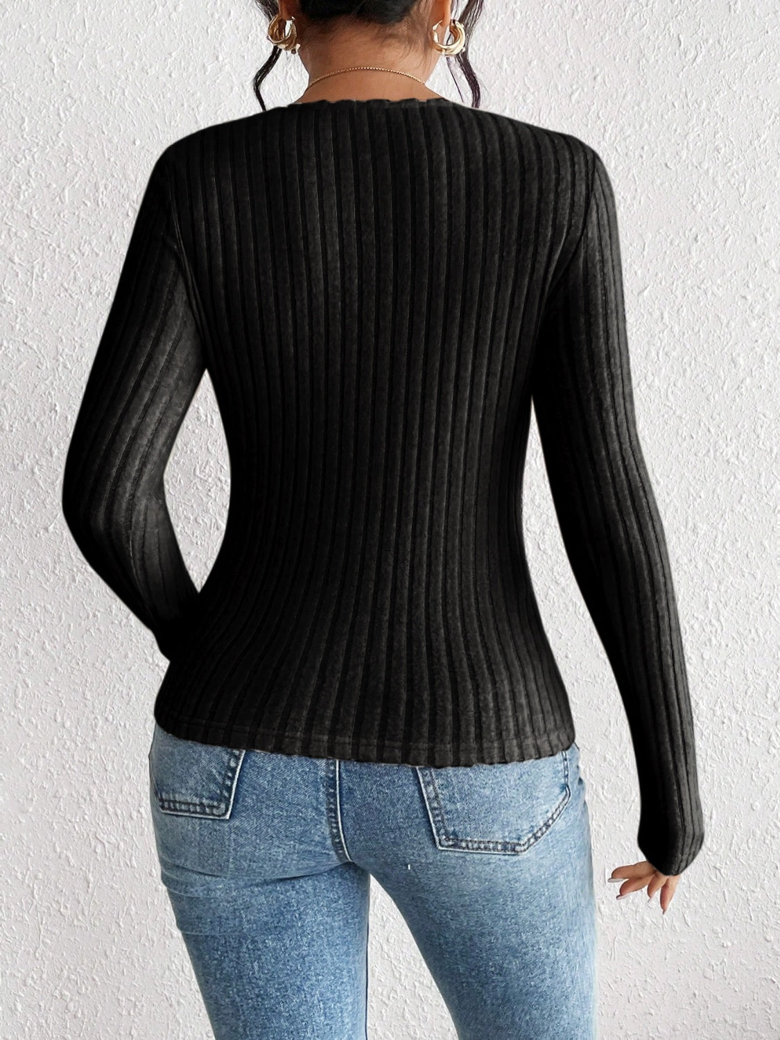 Black ribbed long sleeve bodysuit with sweetheart neckline detail