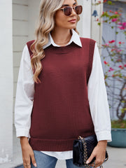 Burgundy ribbed knit vest with crew neck and side buttons, styled over a white shirt.
