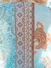 Bohemian patchwork print kimono in light blue with floral and geometric patterns.