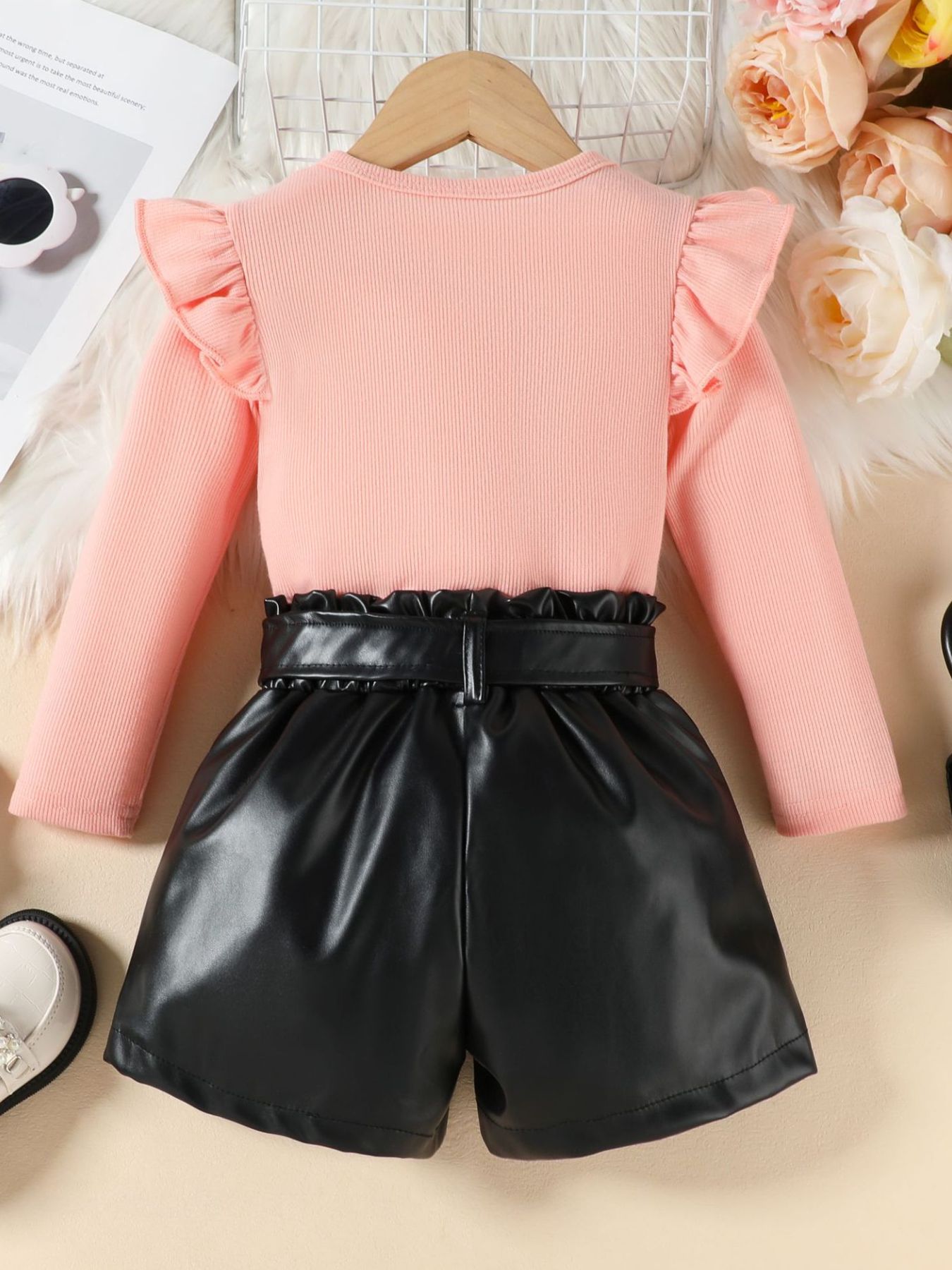 Pink ruffled sleeve top with black faux leather belted shorts set for baby girls.
