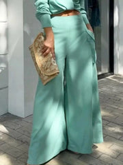 Teal two-piece set with pocketed wide-leg pants and long-sleeve top.
