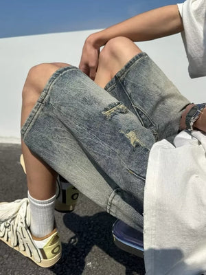 Men's Full Size Distressed Denim Shorts in Light, model styling view