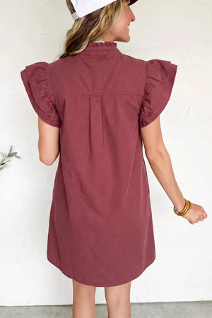 Ruffled sleeve denim mini dress with button-down front and high neckline.