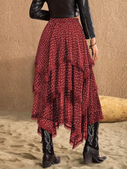 Burgundy tiered midi skirt with white polka dots and lace trim.