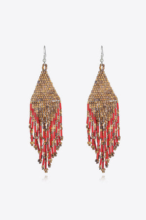 Prismatic beaded fringe earrings in gold and red with a cascading design.