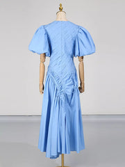 Puff Sleeve Ruched Midi Dress in Green, close-up detail