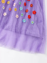 Purple tulle baby dress with colorful floral embroidery.