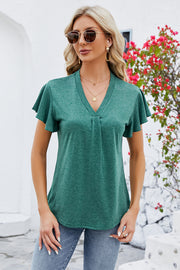 V-neck pleated flutter sleeve top in dark blue with a casual fit.