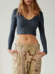 Navy ribbed crop top with long sleeves and a v-neckline.