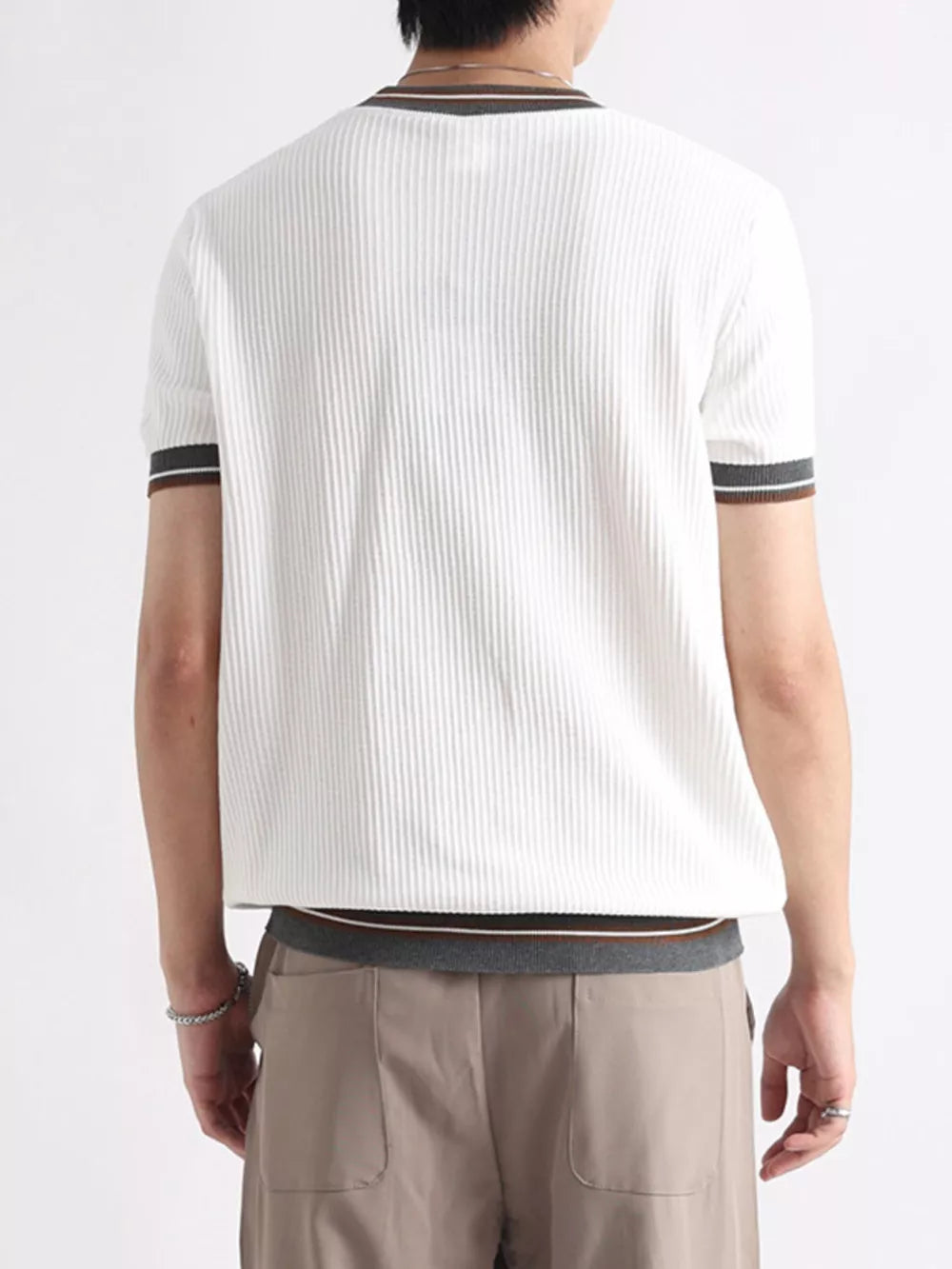 Textured ribbed white crew neck t-shirt with striped trim on sleeves and hem