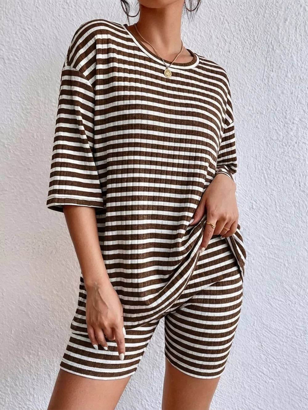 Chic striped two-piece set with elbow sleeves and shorts in coffee stripes.