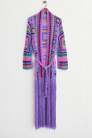 Granny square crochet duster in Lilac with colorful stripes and long fringe.