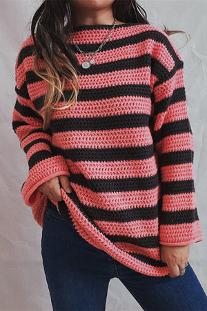Pink and black striped boat neck knit sweater with open knit texture.