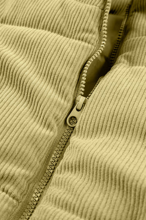 Corduroy padded vest in sage with a zipper detail.