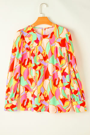 Psychedelic print blouse with gathered yoke and long sleeves in Floral.
