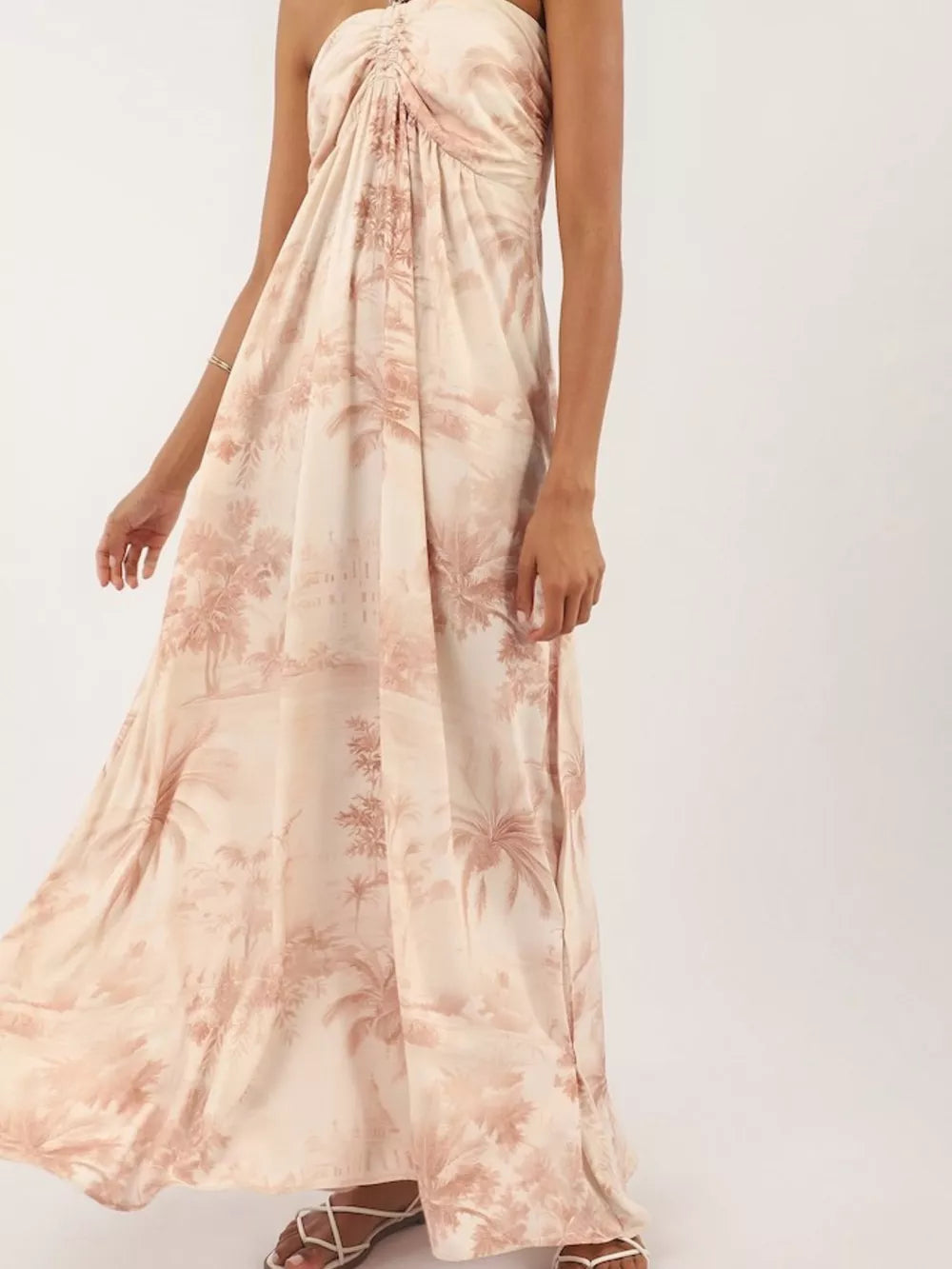 Tropical halter neck maxi dress in cream with a palm tree print and ruched bodice.