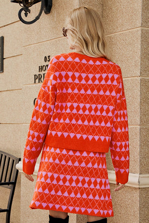 Orange argyle knit cardigan and mini skirt set with pink diamond pattern.