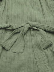 Sage green crinkled texture tie waist wide leg maternity jumpsuit detail