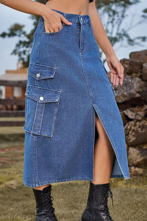 Denim midi skirt with cargo pockets and front slit in medium wash.